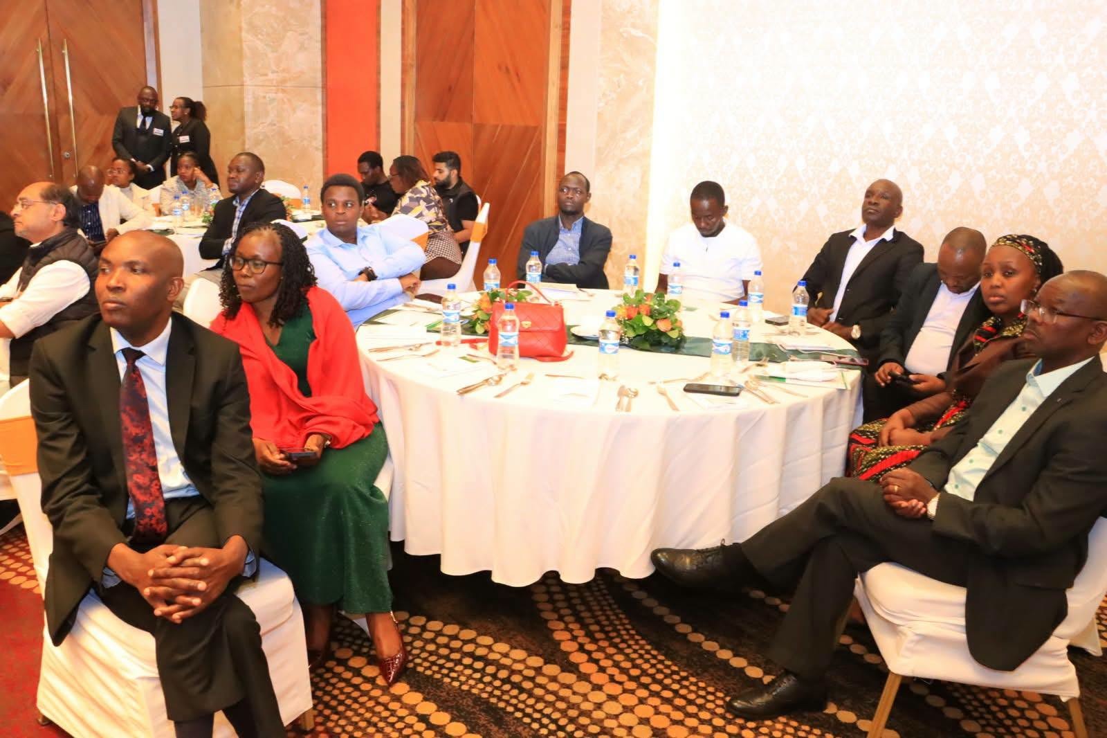 Delegates seated at round tables